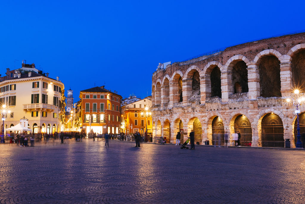 Roman amphitheatre Arena di Verona and Piazza Bra square at night. Verona, Veneto, Italy, Europe