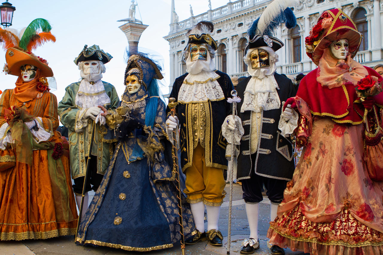 Group in beautiful costumes at the Carnival of Venice