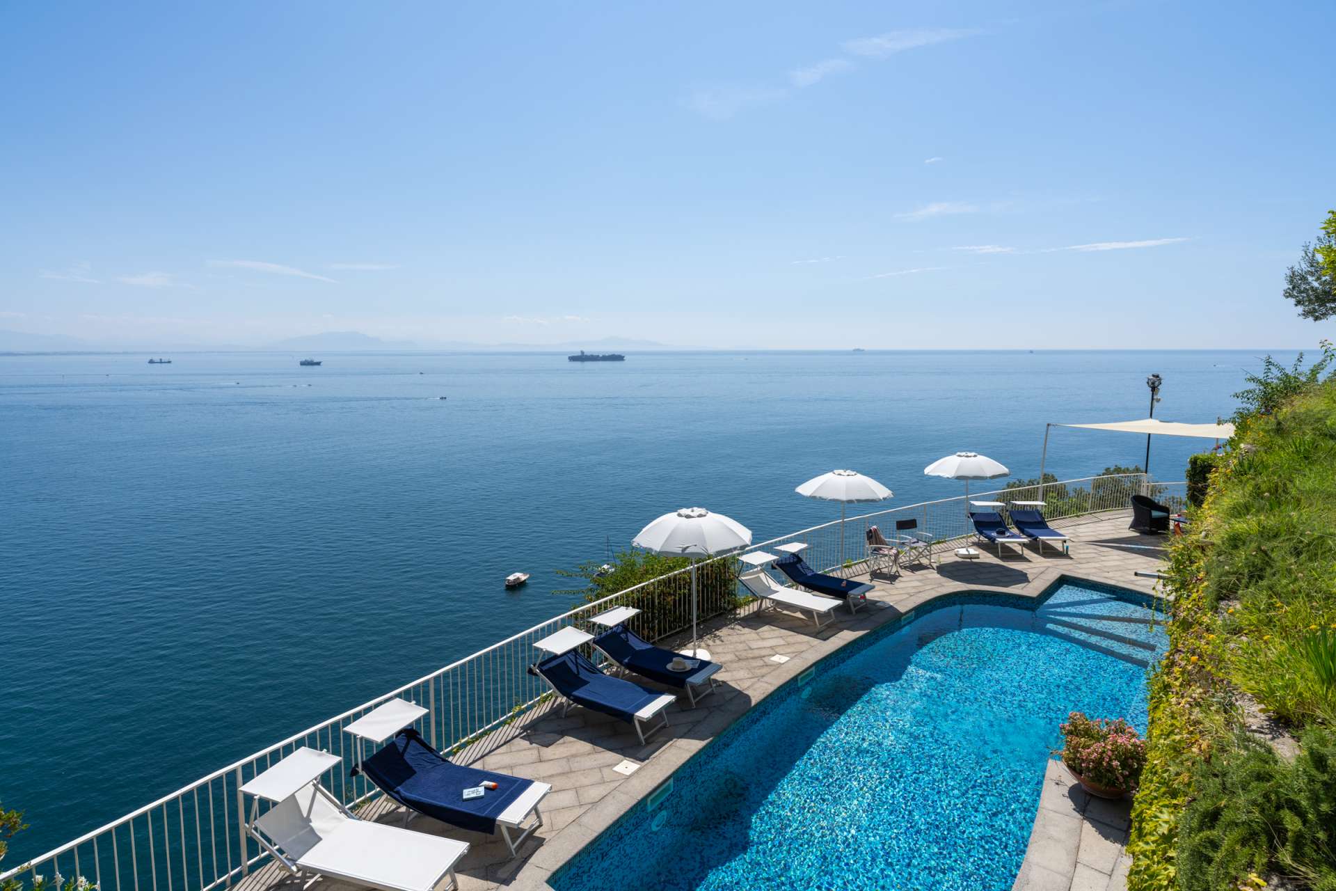 Swimming pool at Torre Onda Vetra with panoramic sea views in Vietri sul Mare on the Amalfi Coast.