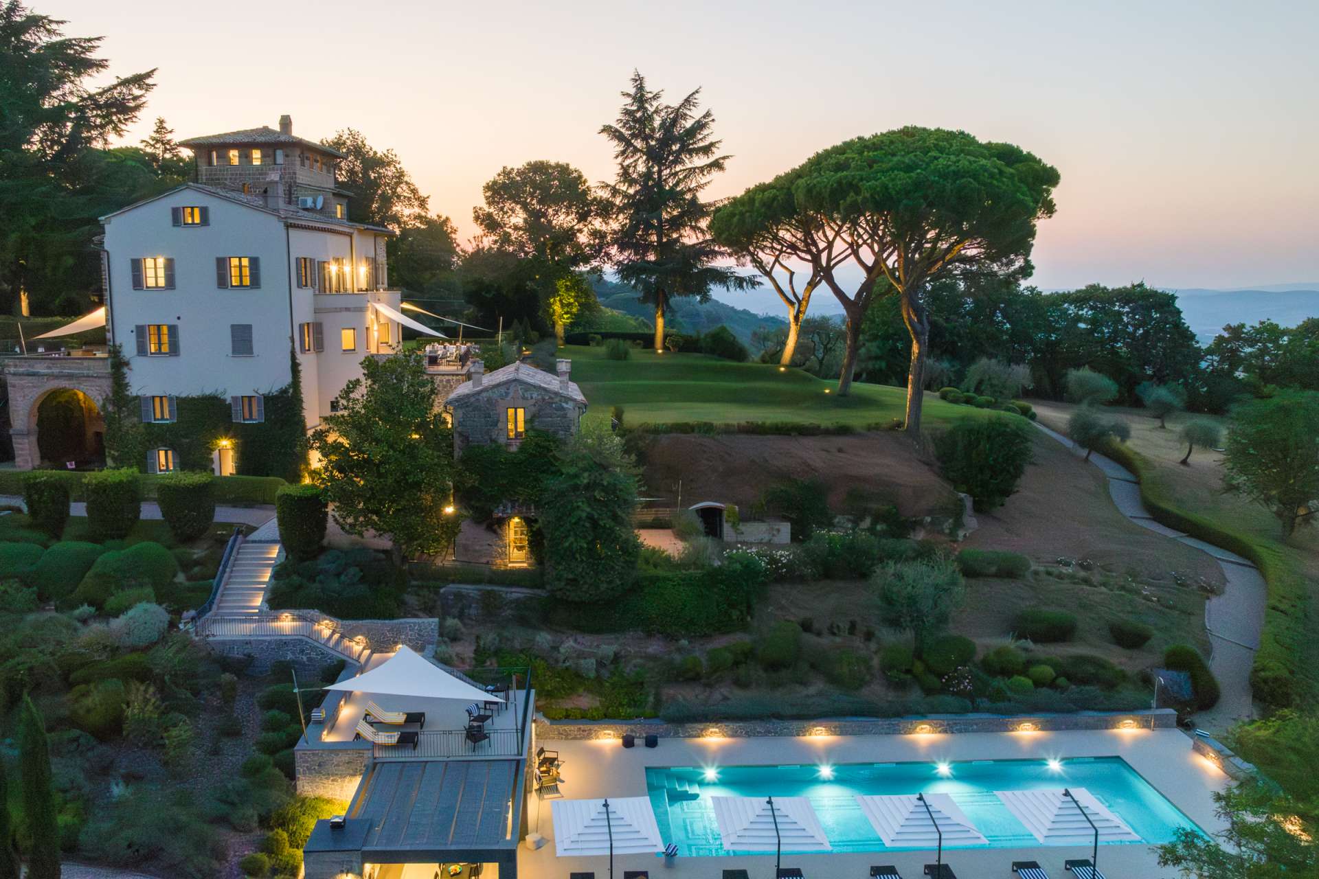 Villa Clara Main house villa on the left, guesthouse in the middle and pool and pool house at the bottom.