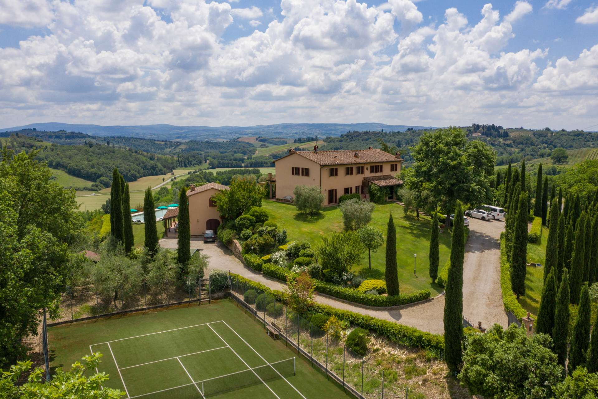 Casa Tara The private tennis astro-turf tennis court.
