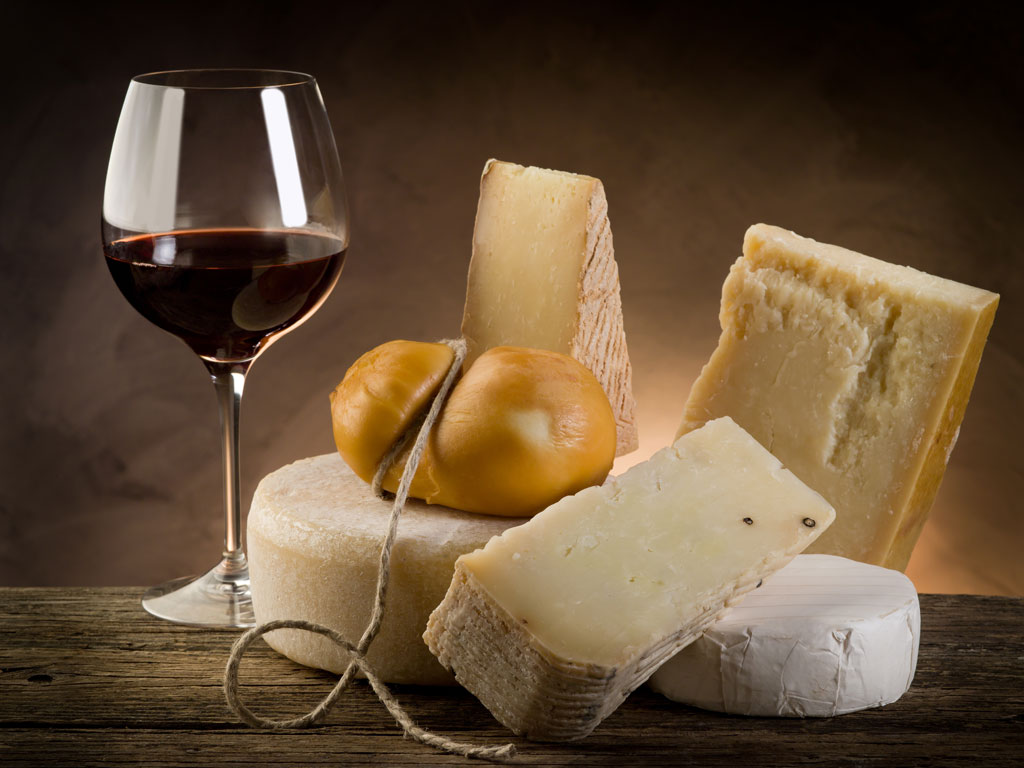 Tuscan wine with aged cheese