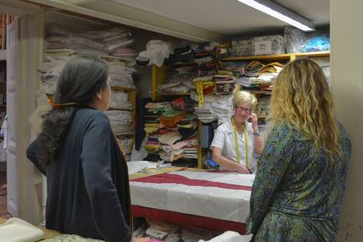 The Artisans of Florence - Women during a workshop in Tuscany discussing with an Florentine artisan