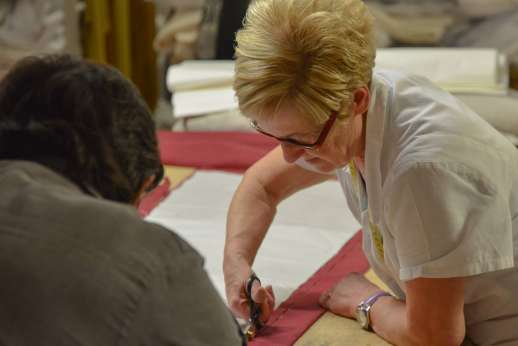 The Artisans of Florence - A Florentine artisan cutting off a piece of clothing