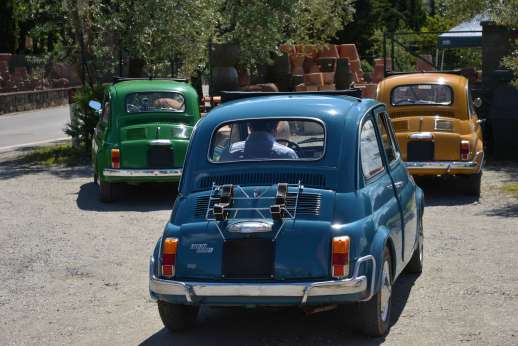 Fiat 500 Tour - Three Classic Fiat 500s parked.