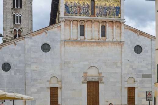 Lucca By Bike Or Foot - A church with historic artwork in Lucca