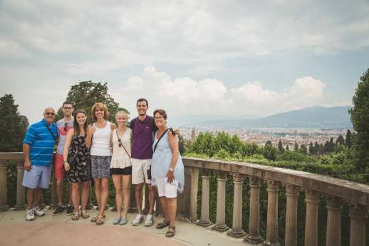 Pitti Palace & Boboli - A group of tourists visit Pitti Palace on a cloudy day