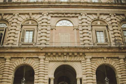 Pitti Palace & Boboli - A wall of old windows and archways at Pitti Palace
