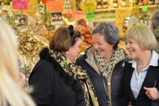 Florence Market Tour - Three women laugh in an Italian market