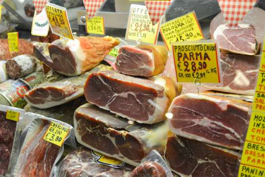 Florence Market Tour - A selection of stacked meats for sale