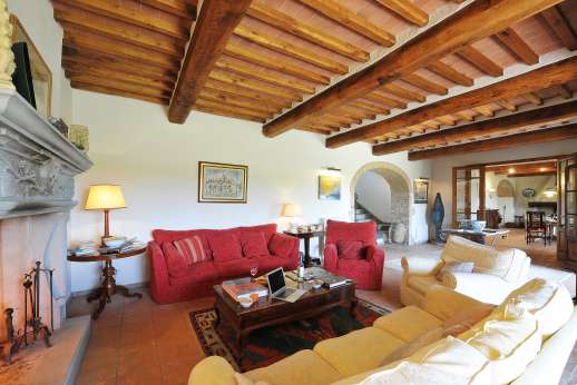 Casa Tara - Main house living room leading into the dining room.