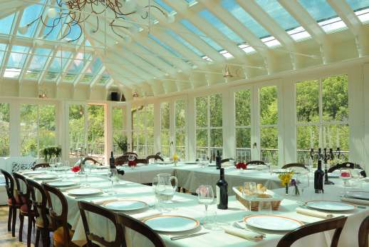 Weddings at I Corbezzoli - The conservatory set for dining