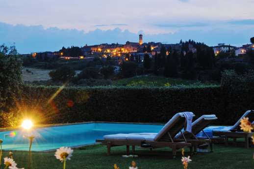 I Tre Cipressi - The fully lit pool perfect for enjoying a refreshing evening swim.