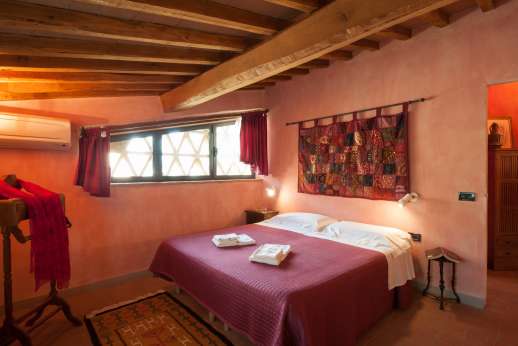 I Tre Cipressi - Another of the double bedrooms each have their own unique style.