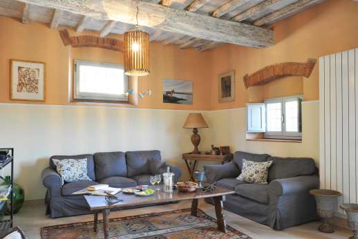 Il Borgo di Petroio - Large sitting room on the ground floor of the main house.