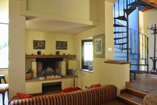 L’Olmo (x 4 people) with Staff and Cook - Sitting room with an open fireplace,
