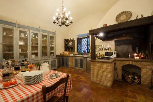 La Fattoria di Sarteano - The old working kitchen with open fireplace