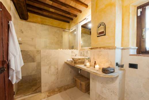 Rosso Fiorentino - Master bedroom bathroom with walk-in shower