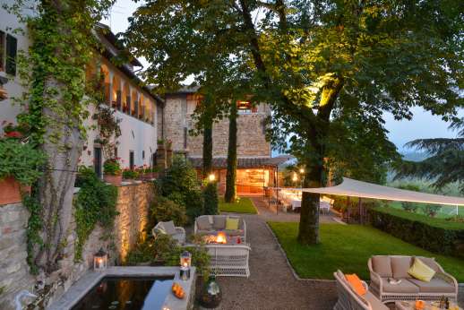 The Estate Of Petroio - Outsite seating area between the main villa and the pool