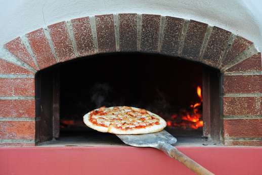 The Estate of Petroio with Staff and Cook - Outside pizza oven at the villa. As part of the extra services you are able to book a chef to cook authentic Italian pizza.