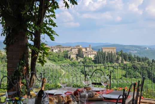Villa al Monte - The large terrace with shaded seating and dining areas.
