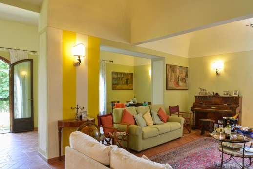 Villa Astori - Ground floor, main house spacious sitting room with a fireplace.
