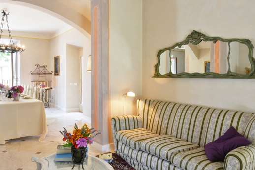 Villa Atena - Main house sitting area leading through to dining room.