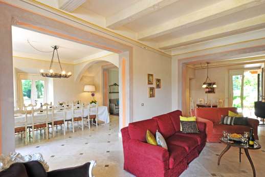 Villa Atena - View from the sitting room of the dining room with French doors leading to the terrace.