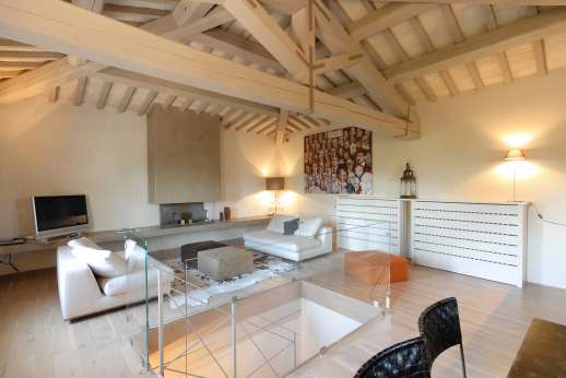 Villa Di Masseto - The Tower, up 16 metal steps to a large sitting area with a flat-screen TV. Kitchenette.