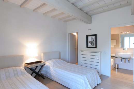 Weddings at Villa Di Masseto - The Tower, air-conditioned twin bedroom with en suite bathroom.