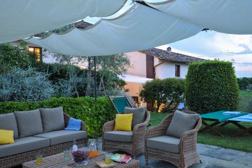 Gugliaie (x 14 people) with Staff and Cook - Seating area by the pool in the evening