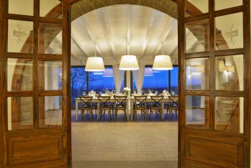 Weddings at Villa Ostignano - Living room leading through to the conservatory