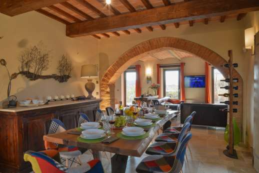 Poggiobuono - The dining table looking through to the lounge