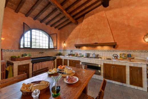 Poggio Ai Grilli -  Large fully equipped kitchen with direct access to the al fresco dining area
