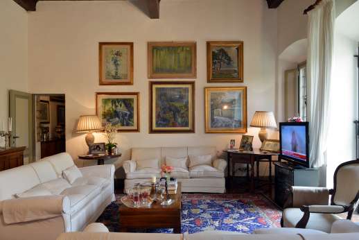 Villa San Martin - Two large sittings rooms each with high beamed ceilings and both leading out to the courtyard.