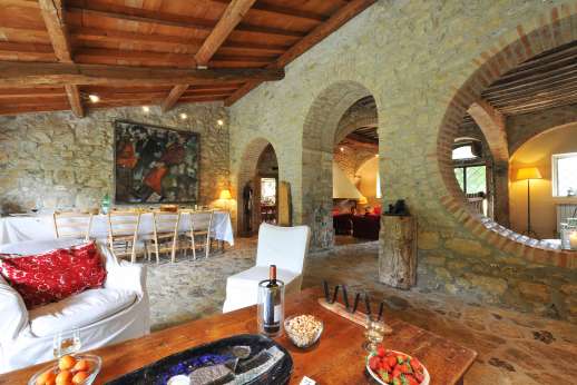 La Pergola di Montegiove - Part of the sitting area with fireplace, Wireless ADSL internet connection is available.