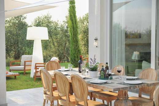 Villa Amerini -  Shaded dining area conveniently located just outside the kitchen and separate shaded sitting area on the grounds.