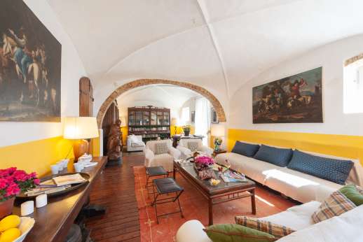 Tizzano - Large sitting room with vaulted ceiling on first floor.
