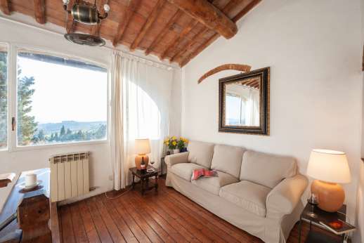 Tizzano - Top of the stairs relaxing seating area with stunning view