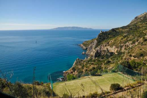 Spini Bianchi - Astro turf tennis court further down the hillside.