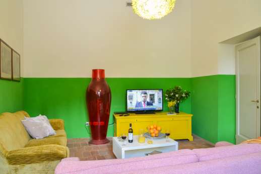 Villa Caprolo - TV room with Satellite TV [Sky channels] and DVD.