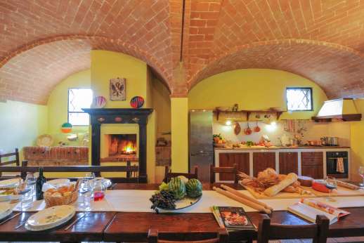 Ocrata Bianca - 24 seater dining table and a working fire place