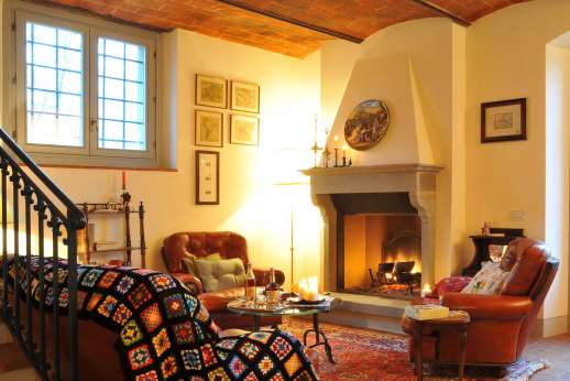 Podere Brogi - In the sitting room a working fireplace for those cooler months.