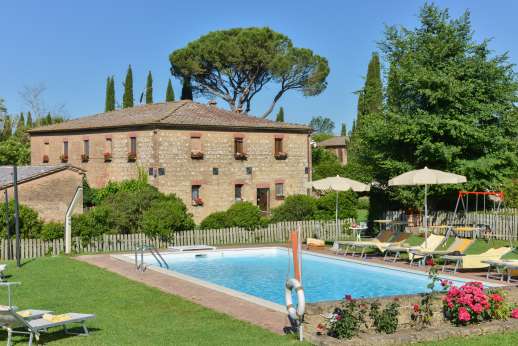 Ocrata Bianca - The swimming pool is set at the top of the lawned garden, reached through a gate for security