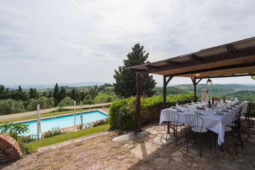 Tizzano - Charming pergola with stunning view for al fresco dining.