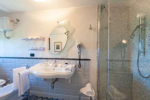 En-suite chromotherapy bathroom with shower