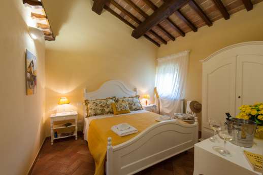 Solomonio - New Wing/Upper Ground Floor - air-conditioned double bedroom with an ensuite bathroom