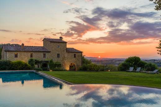 Podere Celli (x 22 people) with Staff and Cook- Sunset at the villa reflected in the huge swimming pool