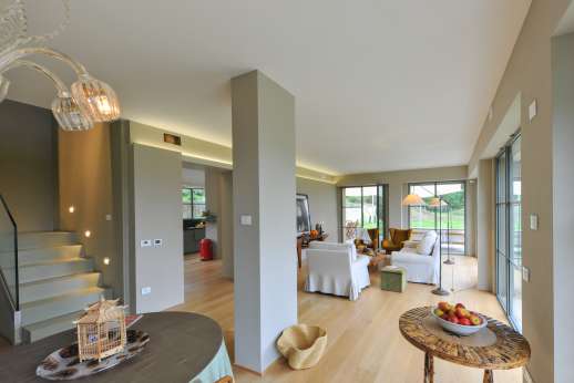 Il Soldano- Tv room with sofa and two armchairs