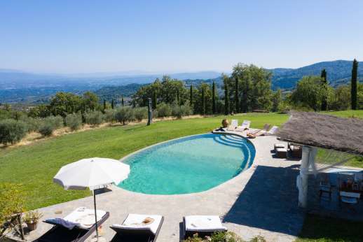 Il Cortile Pratolino - The oval swimming pool, 7.5 x 12.5m/24 x 41 feet, has an infinity edge